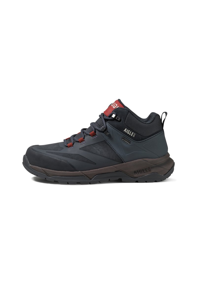 Schwarz-gelber Mid-Cut-Wanderschuh mit roten Akzenten, ausgestattet mit einer strukturierten Oberseite, einem Schnürsystem und einer Gummisohle für Langlebigkeit und Grip.