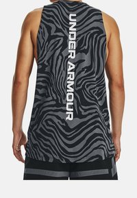 Sleeveless black tank top with a gray zebra stripe pattern, featuring large white "UNDER ARMOUR" text vertically on the back.