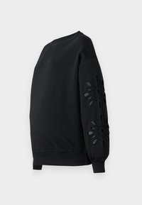 Black sweatshirt with a round neckline and puffed sleeves, featuring laser-cut floral patterns on the sleeves and a smooth texture.