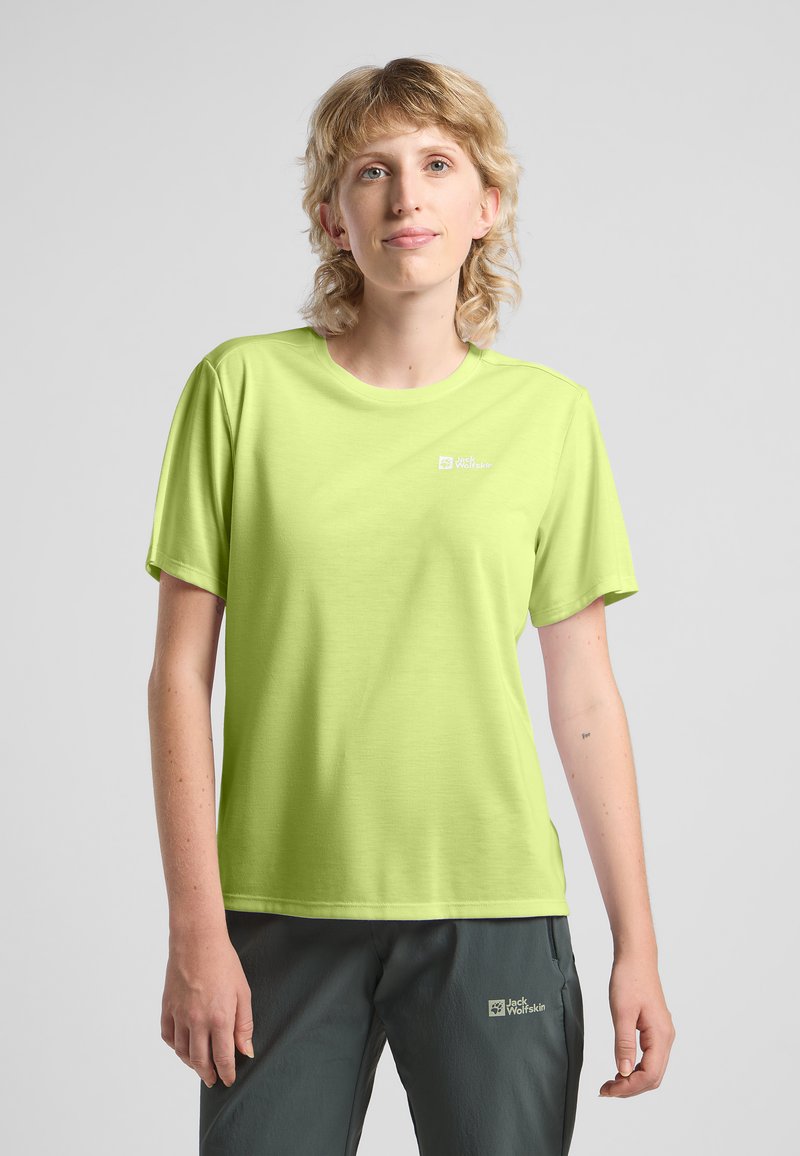T-shirt a maniche corte verde lime realizzato in tessuto liscio, con un piccolo logo sul petto sinistro e scollo rotondo.