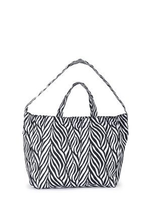 Black and white zebra print fabric tote bag with short and long handles, displayed on a white background.
