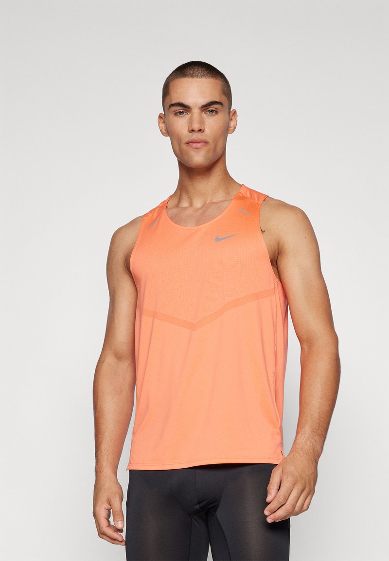 Nike Performance RISE TANK - Top - light wild mango/reflective silver