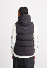 Helly Hansen ADORE  - Smanicato - black