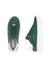 Green suede sneakers with a smooth white sole, round toe, and six eyelets. Features a logo on the tongue and a textured side panel design.