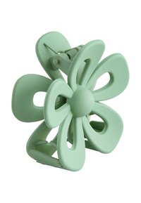 Pince à cheveux en plastique vert menthe en forme de fleur à cinq pétales, avec un centre arrondi et un mécanisme à ressort pour une fermeture sécurisée.
