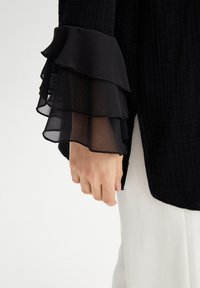 Touché Privé FRILLY ARMED  - Tunika - black