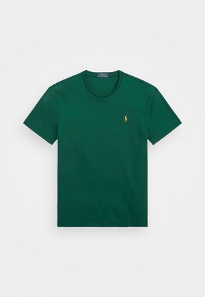 T-shirt vert foncé à manches courtes et col rond avec petit logo Polo Ralph Lauren jaune brodé sur le côté gauche de la poitrine.