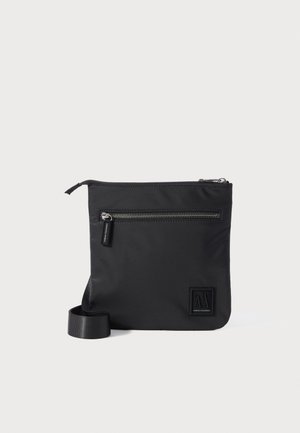 ICON FLAT CROSSBODY UNISEX - Cross body bag - black