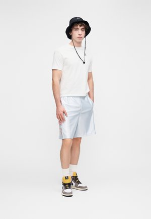 Poradie 1: Jordan - M J BRK CAT SCRATCH SHORT - Tepláky