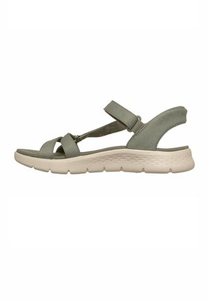 Sandalo verde chiaro aperto con cinturini regolabili e suola imbottita e testurizzata per uso all'aperto casual.