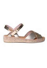 Metallic gold espadrille sandal with crossed straps, jute-wrapped wedge sole, adjustable ankle strap, and smooth textured finish.