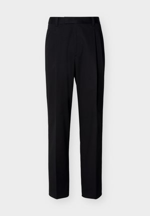 Pantalones negros de corte recto hechos a medida, con presillas para cinturón y pliegue frontal, exhibidos sobre un fondo claro y liso.