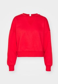 Felpa rossa corta con scollatura a V, maniche lunghe e polsini a costine. Tessuto a superficie liscia, design minimalista senza loghi visibili.