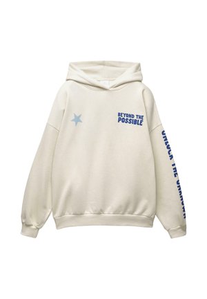 Cremfarbener Hoodie mit blauer Sternapplikation auf der Brust, dem Text "BEYOND THE POSSIBLE" auf der Vorderseite rechts und dem Text "UNLOCK THE UNKNOWN" entlang des linken Ärmels.