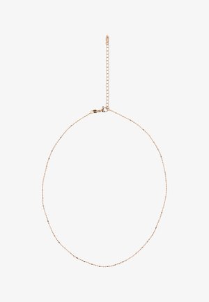 Colier delicat cu lanț din aur, cu mărgele mici rotunjite și închizătoare tip homar, prevăzut cu un lanț extensibil reglabil.