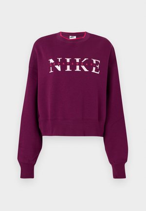 Ljubičasti skraćeni dukserica s dugim rukavima, rebrastim manžetama i "NIKE SPORTSWEAR" logotipom u ružičastoj i bijeloj boji na prsima.