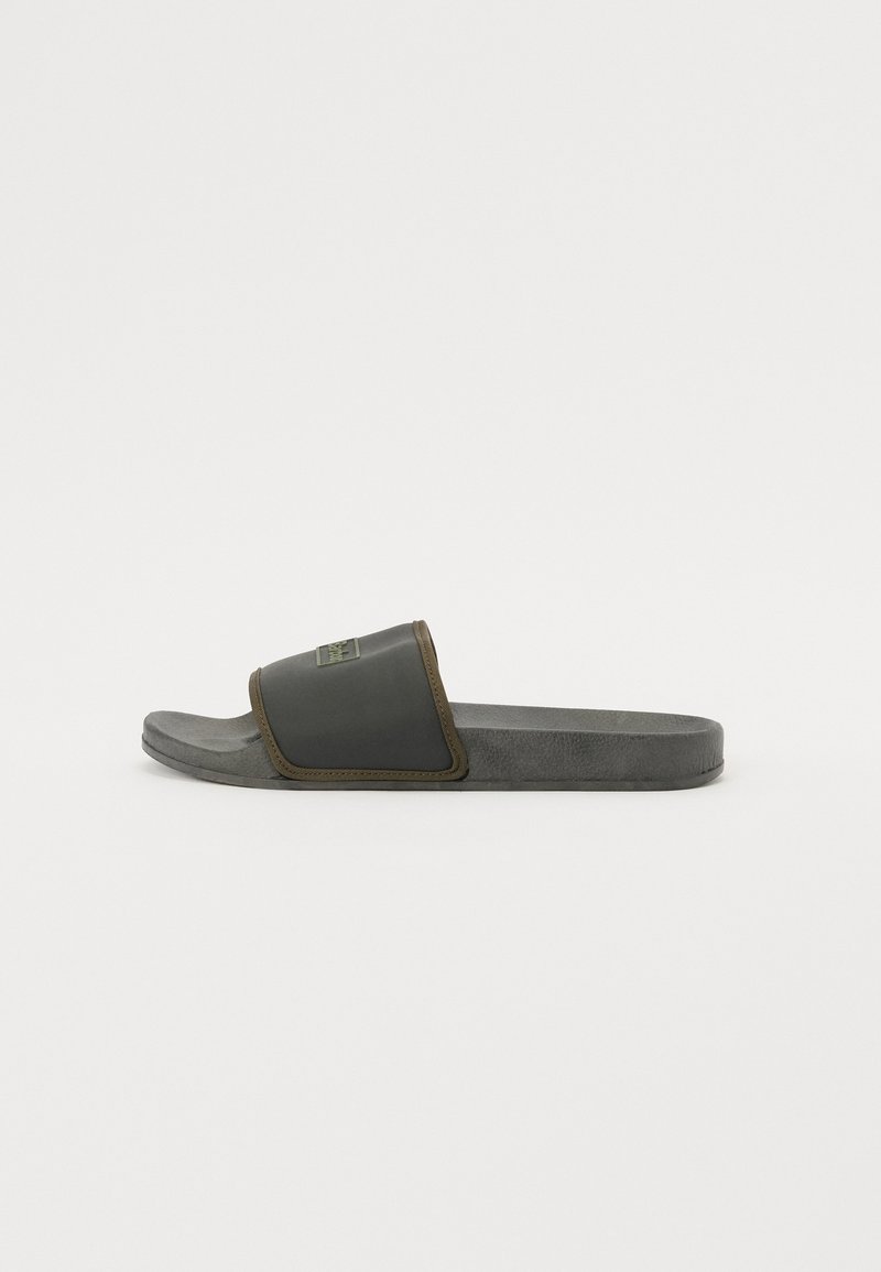 Gray slide sandal with a padded black strap, olive green accents, and a textured footbed. Designed for casual wear with a minimalist appearance.