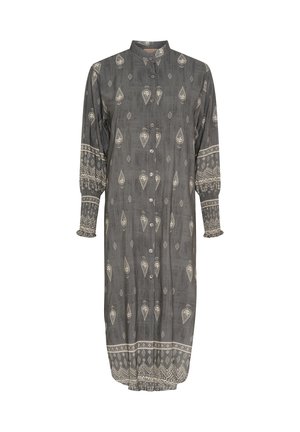 Grå langærmet kjole med knaplukning, der har hvide paisley- og diamantmønstre, samlede ærmer og dekorative manchetter.