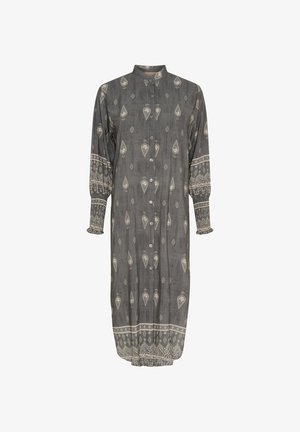 Grå langærmet kjole med knaplukning, der har hvide paisley- og diamantmønstre, samlede ærmer og dekorative manchetter.