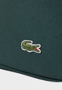 Lacoste ROLL BAG UNISEX - Ranac - sinople