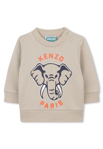Sweatshirt beige à manches longues, avec un graphique d'éléphant et le texte "KENZO PARIS" en orange. Col et poignets côtelés.