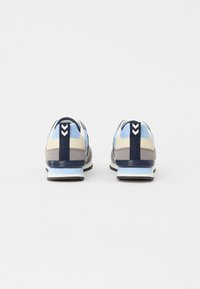 Sport shoes in light blue, gray, and navy. Features a textured material, cushioned heel, and a striped accent on the heel tab.