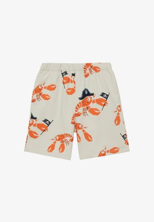 Beżowe szorty z elastycznym pasem, na których znajduje się pomarańczowy nadruk homara w kapeluszu pirata, trzymającego czarne pirackie flagi.