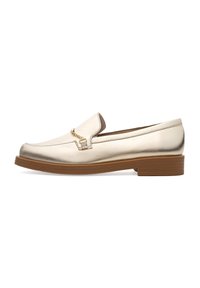 Gold leather loafers with a rounded toe, featuring a small decorative chain detail and a low, brown block heel. Smooth texture, minimal design.