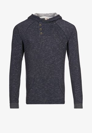 Námořnická mikina s kapucí z měkké látky, vybavená přední kapsou a trojitou knoflíkovou légou. Žebrované manžety dodávají texturu a pohodlné uchycení.