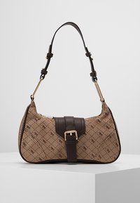 Small brown handbag with dark brown strap, gold buckle, and patterned fabric with repeating logo design, displayed on white pedestal.