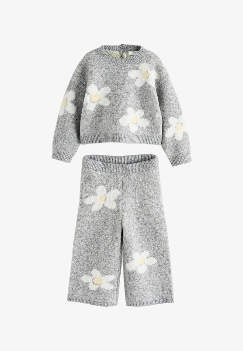 Cozy gray knit sweater and wide-leg pants set with white and yellow flower patterns on sleeves, chest, and legs.