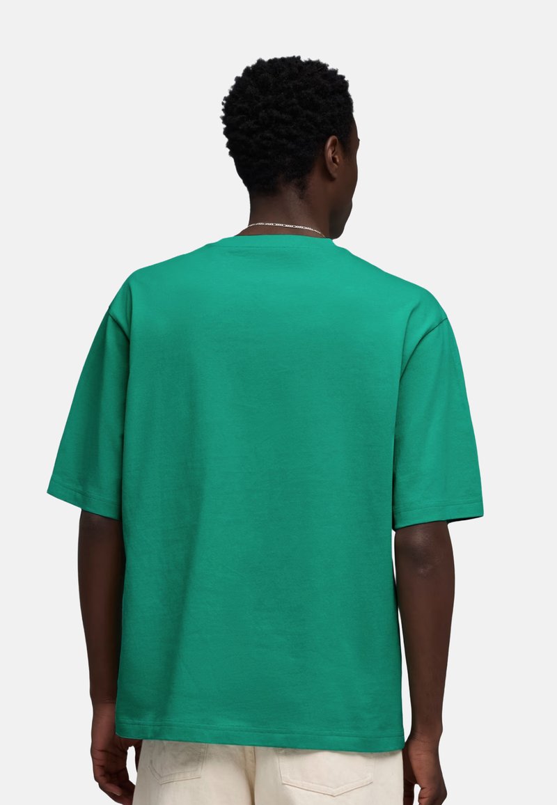 Puma WARDROBE ESS BOXY TEE 040 VAR - Jednoduché tričko - mottled light gre