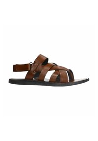 Brown leather sandals with wide cross straps, adjustable ankle strap, flat black sole, and textured finish. Open-toed design.