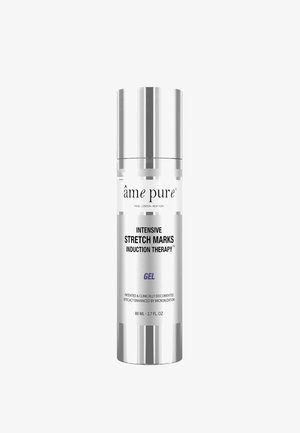 Clear glass bottle with silver metal pump and cap. Label features black text on white background, indicating product details and volume.