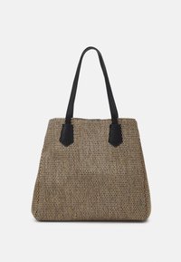 Sac fourre-tout en matière tissée couleur fauve et noir, avec une forme structurée, deux anses noires et des accents de tissu contrastants.