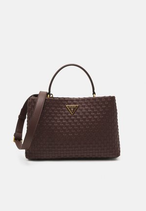 Brown woven handbag with a structured shape, featuring a top handle and removable shoulder strap. Gold logo accent on the front.