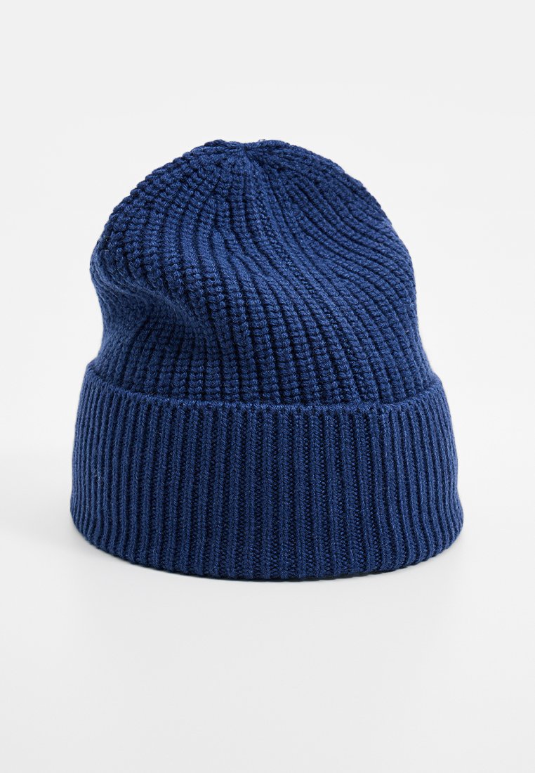 Dark blue knitted beanie hat with folded cuff and ribbed texture, shown on a white background.