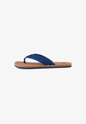 Brown textured sole flip-flop sandal with wide navy blue fabric straps and toe post, shown in side profile on white background.