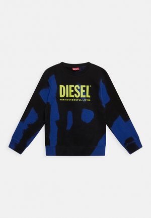 Sweatshirt à manches longues noir et bleu avec le texte « DIESEL for successful living » en jaune vif sur le devant.