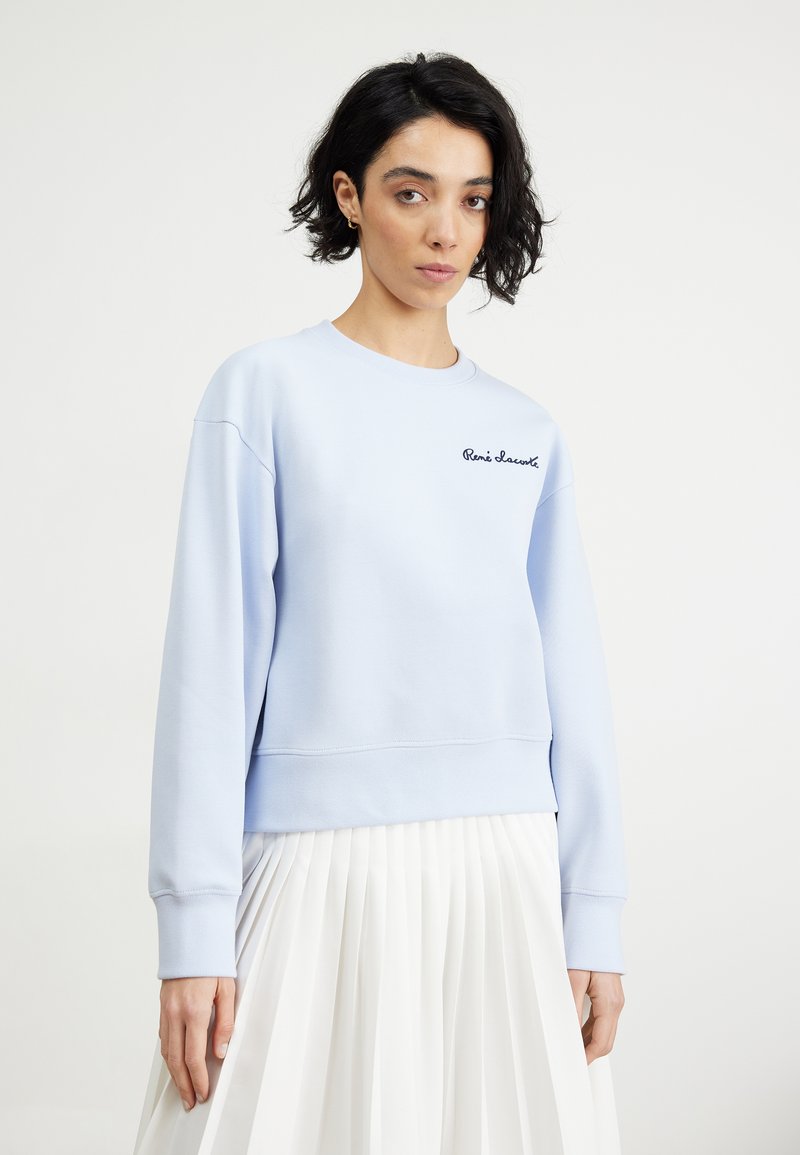 Moschino - Sweat confort à imprimé ours sur l Moschino - Sweat confort à imprimé ours sur l