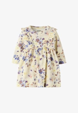 Robe pour bébé à manches longues de couleur crème, imprimé floral en bleu, violet et marron, avec un volant le long de la poitrine et des épaules.