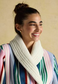 Striped robe with a soft, plush white collar. Colors include pink, blue, green, and red. Features vertical and horizontal stripes.