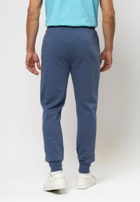 U.S. Polo Assn. TANO - Spodnji deli trenirk - vintage indigo