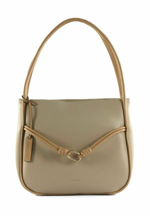 Sac à main en cuir beige avec garniture couleur cuir clair, une bandoulière simple, une lanière décorative nouée avec un anneau ovale doré, et une étiquette de marque sur le côté.