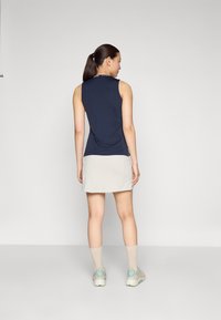 J.LINDEBERG Sports AMELIE MID SKIRT - Gonna sportiva - moonbeam
