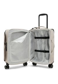 Cream-colored suitcase with a patterned interior, featuring a zippered pocket, compression straps, and four wheels for mobility.
