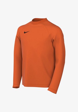 Langärmliges oranges Sportshirt mit einem schwarzen Nike-Swoosh auf der oberen linken Brust und einem gerippten Rundhalsausschnitt.