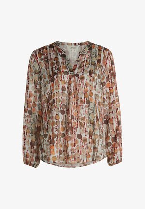 Przezroczysta bluzka z dekoltem w kształcie litery V, długimi rękawami i wielokolorowym wzorem okręgów w odcieniach brązu, czerwieni i beżu.