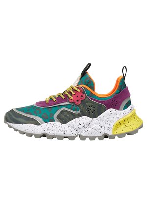 Sport sneakers with a multicolored upper in green, purple, and orange, featuring a speckled white midsole and patterned accents.