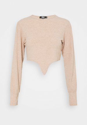 Beige ribbed long-sleeve cropped top with pointed front hem and crew neckline on plain white background.